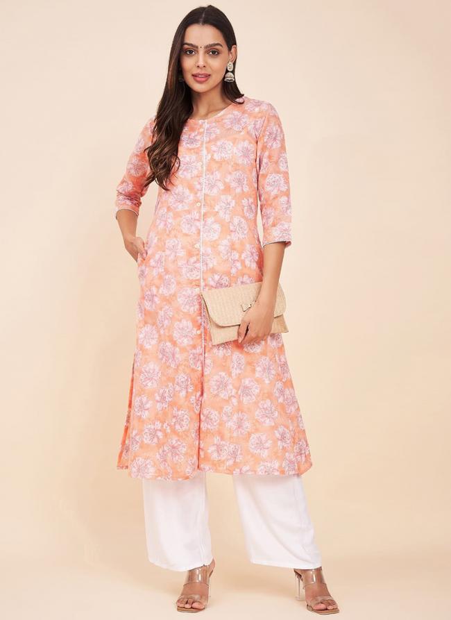 Pure Cotton Peach Traditional Wear Printed Readymade Kurti